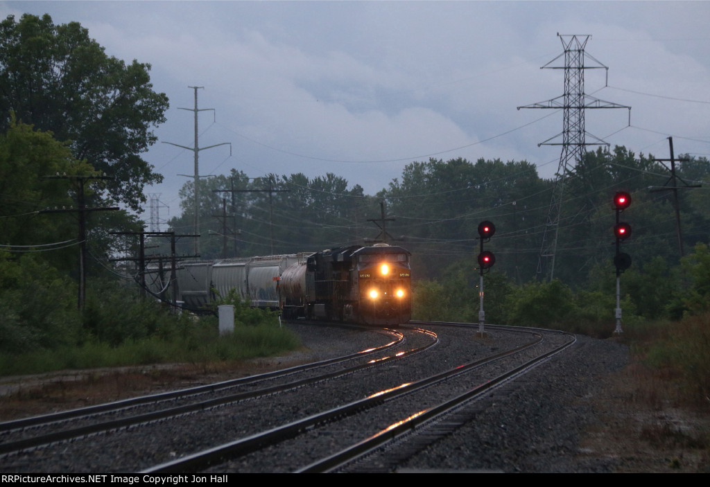 Just after dawn on a wet morning, Z127 comes north through Atwood Jct